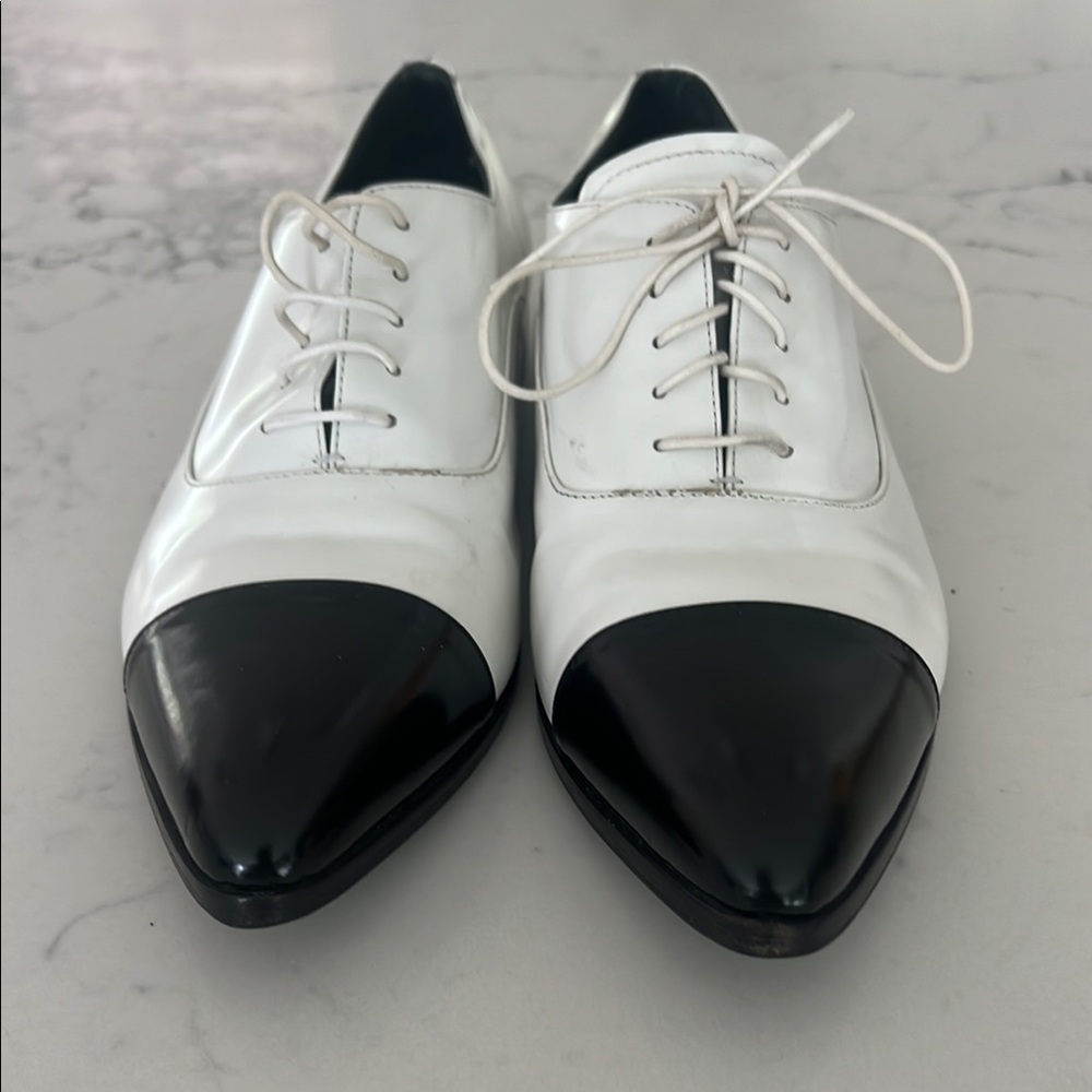 Prada White and Black Flats with Classic Design